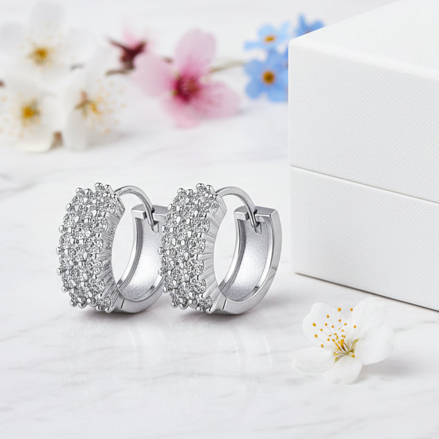 Mosaic Italian Design Micro Inlaid Moissanite Earrings set in Platinum Plated 925 Silver (GRA) Capella Reya close up next to box
