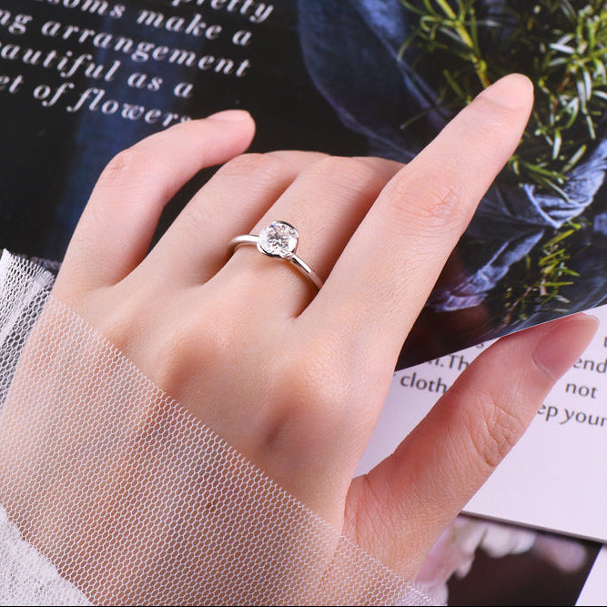 Classic French Round Design 1 Carat Moissanite Diamond Ring set in Platinum Plated 925 Silver (GRA)