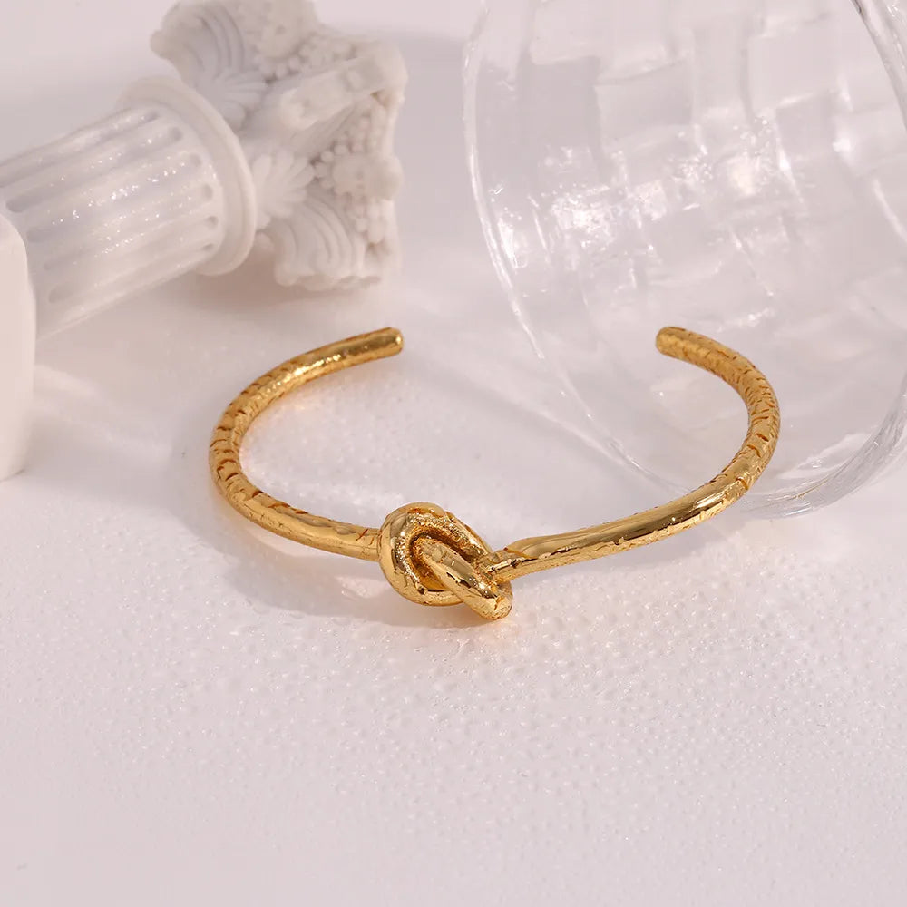 Modern French Inspired Louisa Knot Bangle Bracelet set in 18K Gold Plating Capella Jewellery