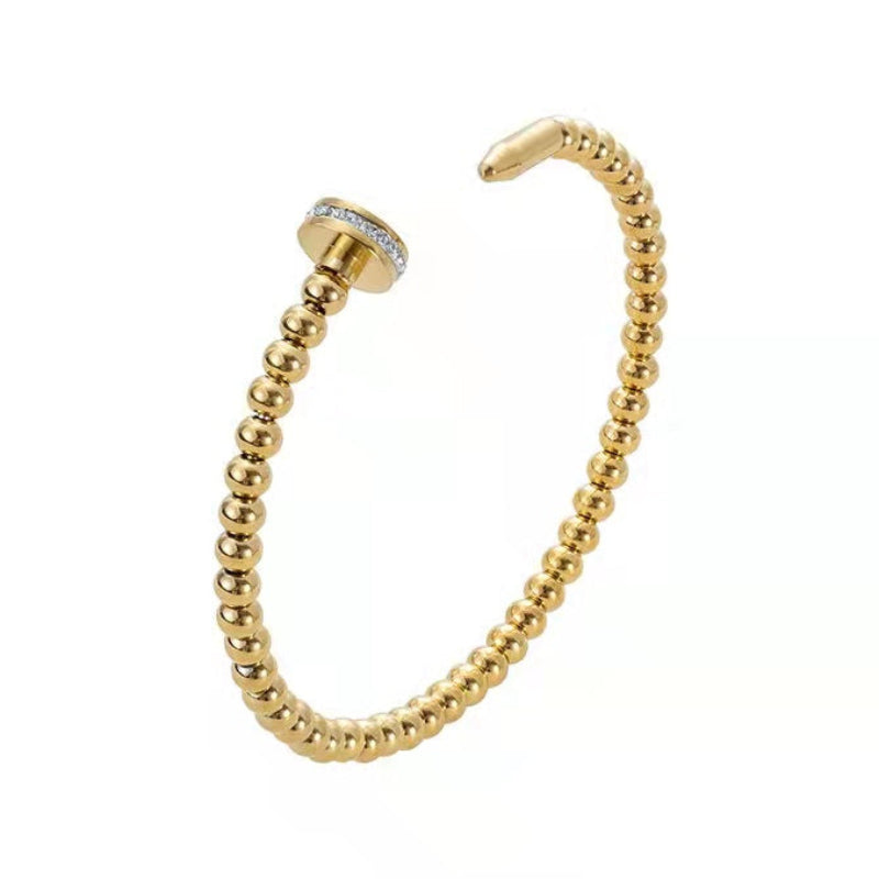 Modern Twist Nail-Studded Natural Zircon Gemstone Bangle Bracelet set in  18K Gold Plating