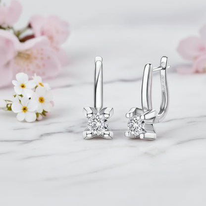 Italian Inspired 1 Carat Moissanite Earrings set in 18K White Gold 925 Sterling Silver (GRA) Capella Reya front view