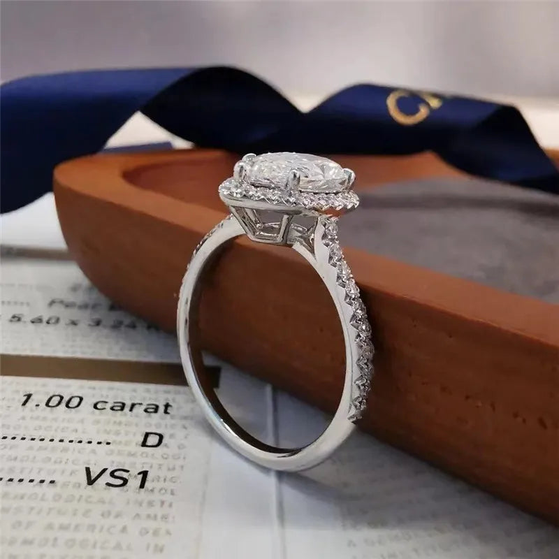French Teardrop Pavé-set 2 Carat Moissanite Diamond Ring set in 18K White Gold Plated 925 Silver