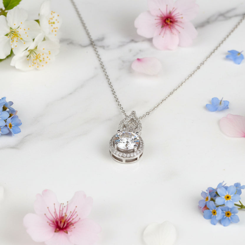 Korean Design 1 Carat Moissanite Diamond Pendant set in Platinum plated 925 Silver (GRA)