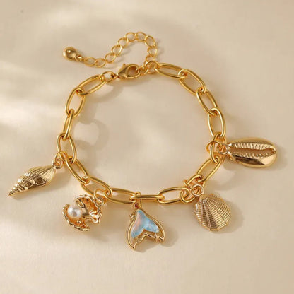 Ocean Inspired Handcrafted Five Pendant Charms Bracelet set in 18K Gold Plating Capella Jewellery