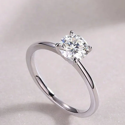 European Four-Claw Solitaire 1 Carat Moissanite Ring set in Platinum Plated 925 Silver (GRA) Capella Jewellery