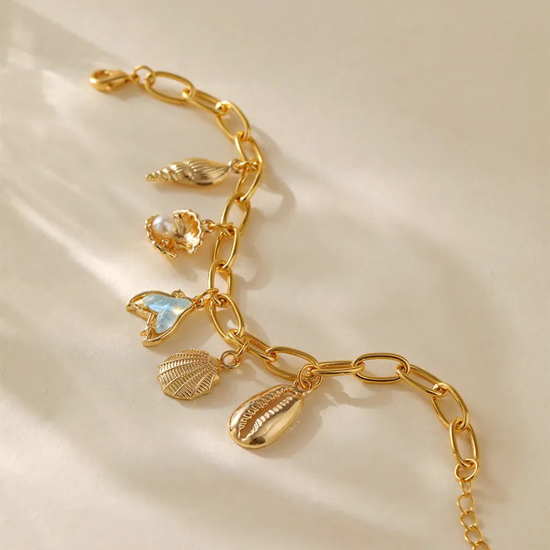 Ocean Inspired Handcrafted Five Pendant Charms Bracelet set in 18K Gold Plating Capella Jewellery