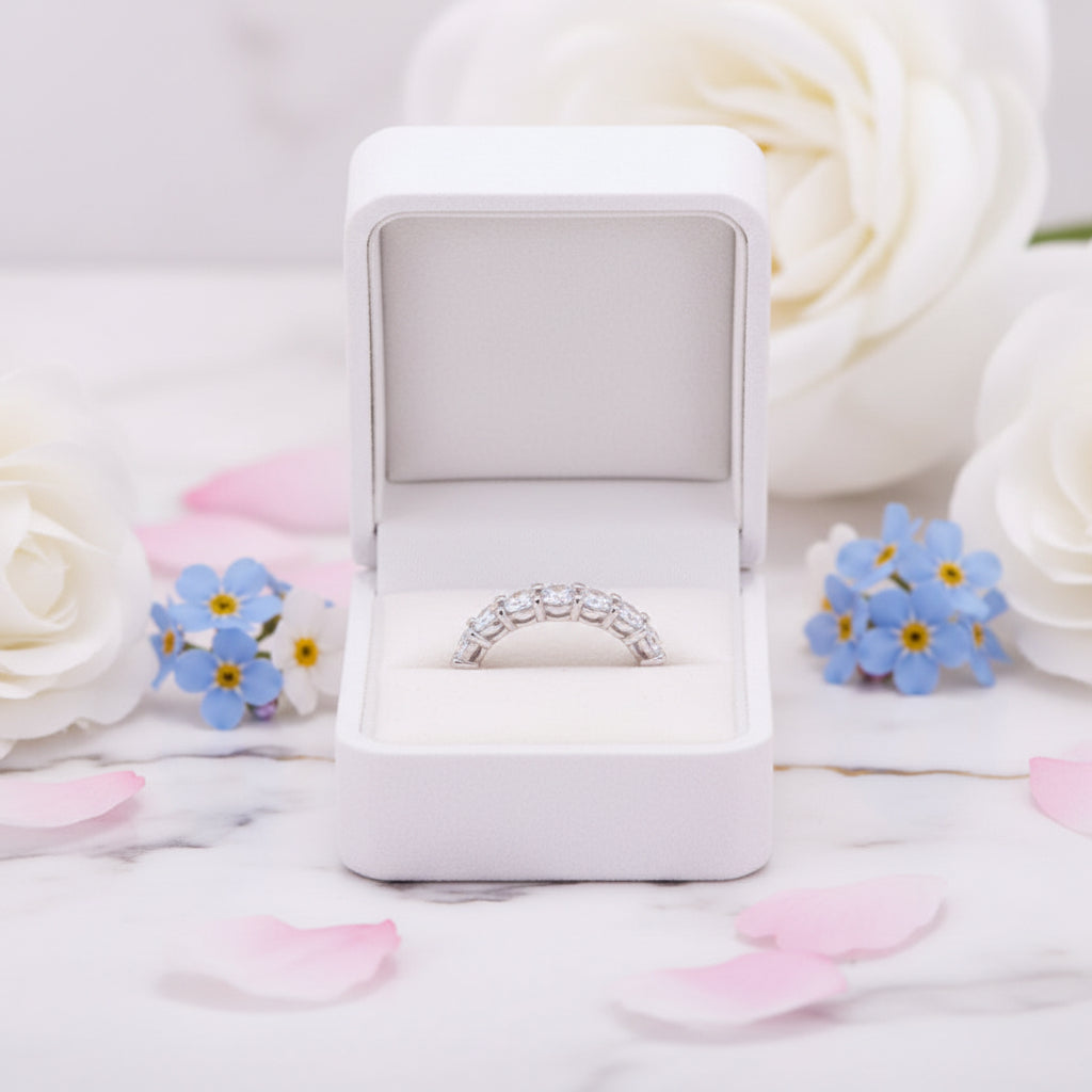 Eternity Four-Claw Row Of Nine 0.1 Carat Moissanite Diamonds set in Pure 18K White Gold Ring