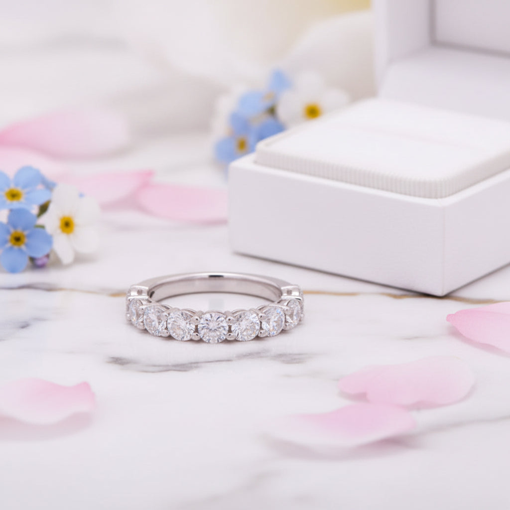 Eternity Four-Claw Row Of Nine 0.1 Carat Moissanite Diamonds set in Pure 18K White Gold Ring