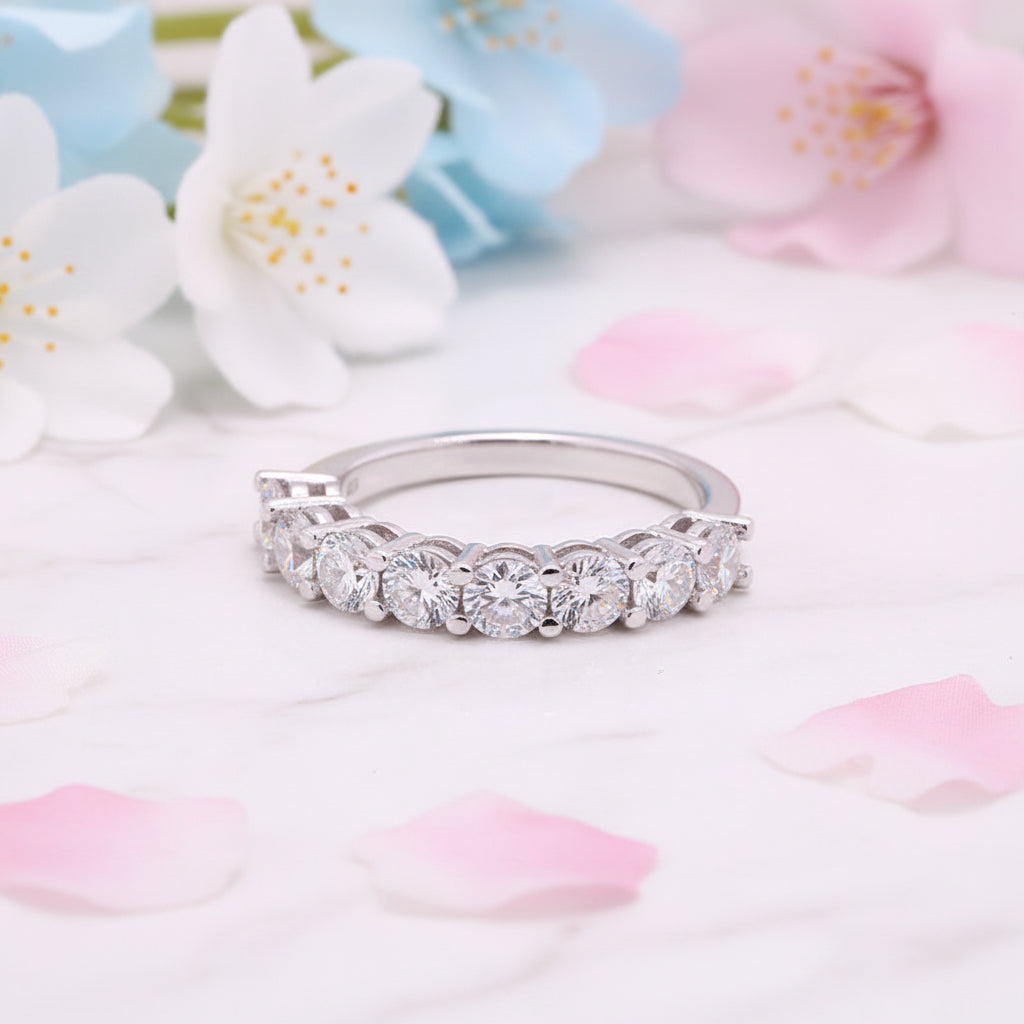 Eternity Four-Claw Row Of Nine 0.1 Carat Moissanite Diamonds set in Pure 18K White Gold Ring