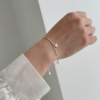 Ocean Starfish and Shell Natural Zircon Gemstone Bracelet set in 925 Sterling Silver Capella Jewellery