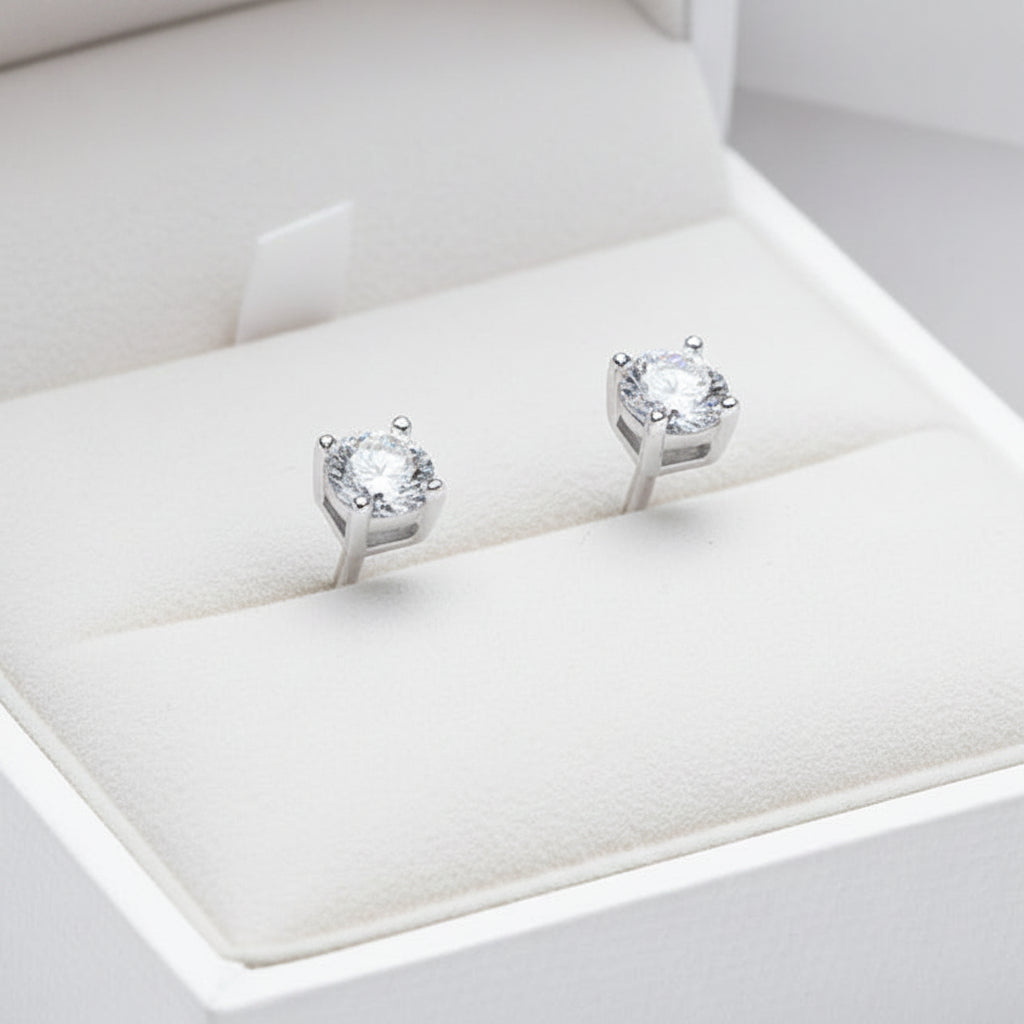 Classic Four-Claw 1 Carat Moissanite Diamond Earrings set in Platinum plated 925 Silver (GRA)