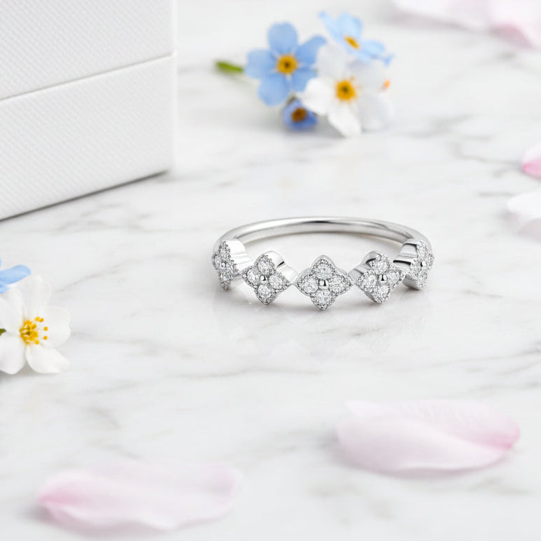 Five Four-Leaf Clover Micro 0.65 Carat Moissanite Diamond Ring set in Platinum Plated 925 Silver