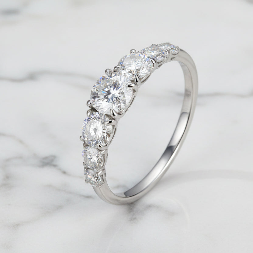 European Seven Stone 0.5 Carat Moissanite Diamond Ring set in Platinum Plated 925 Silver (GRA)