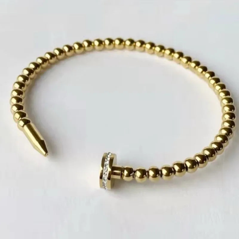 Modern Italian Twist Nail-Studded Natural Zircon Gemstone Bangle Bracelet set in 18K Gold Plating Capella Jewellery