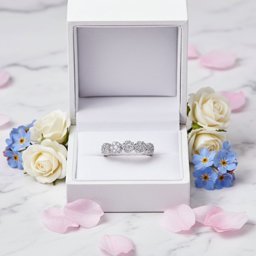 Five Four-Leaf Clover Micro 0.65 Carat Moissanite Diamond Ring set in Platinum Plated 925 Silver