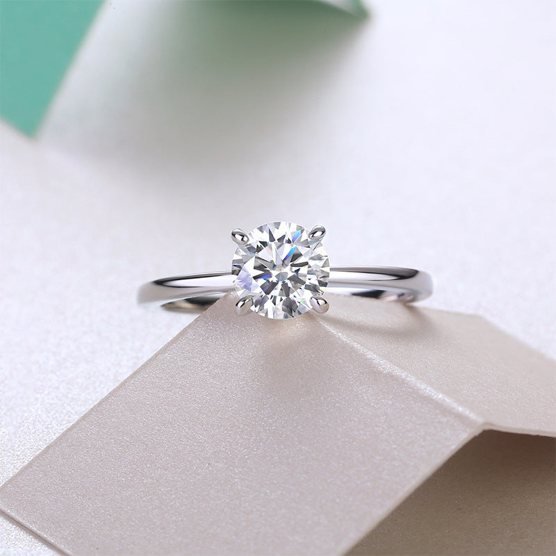 Four-Claw Engagement Ring 1 Carat Moissanite Diamond set in Platinum Plated 925 Silver (GRA)