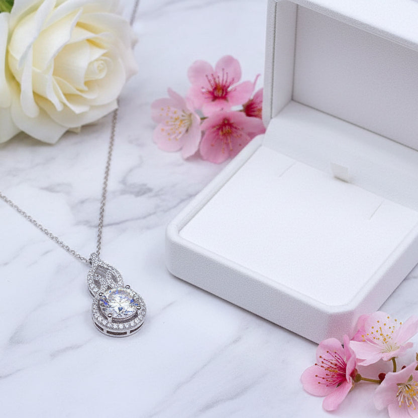 Korean Design 1 Carat Moissanite Diamond Pendant set in Platinum plated 925 Silver (GRA)