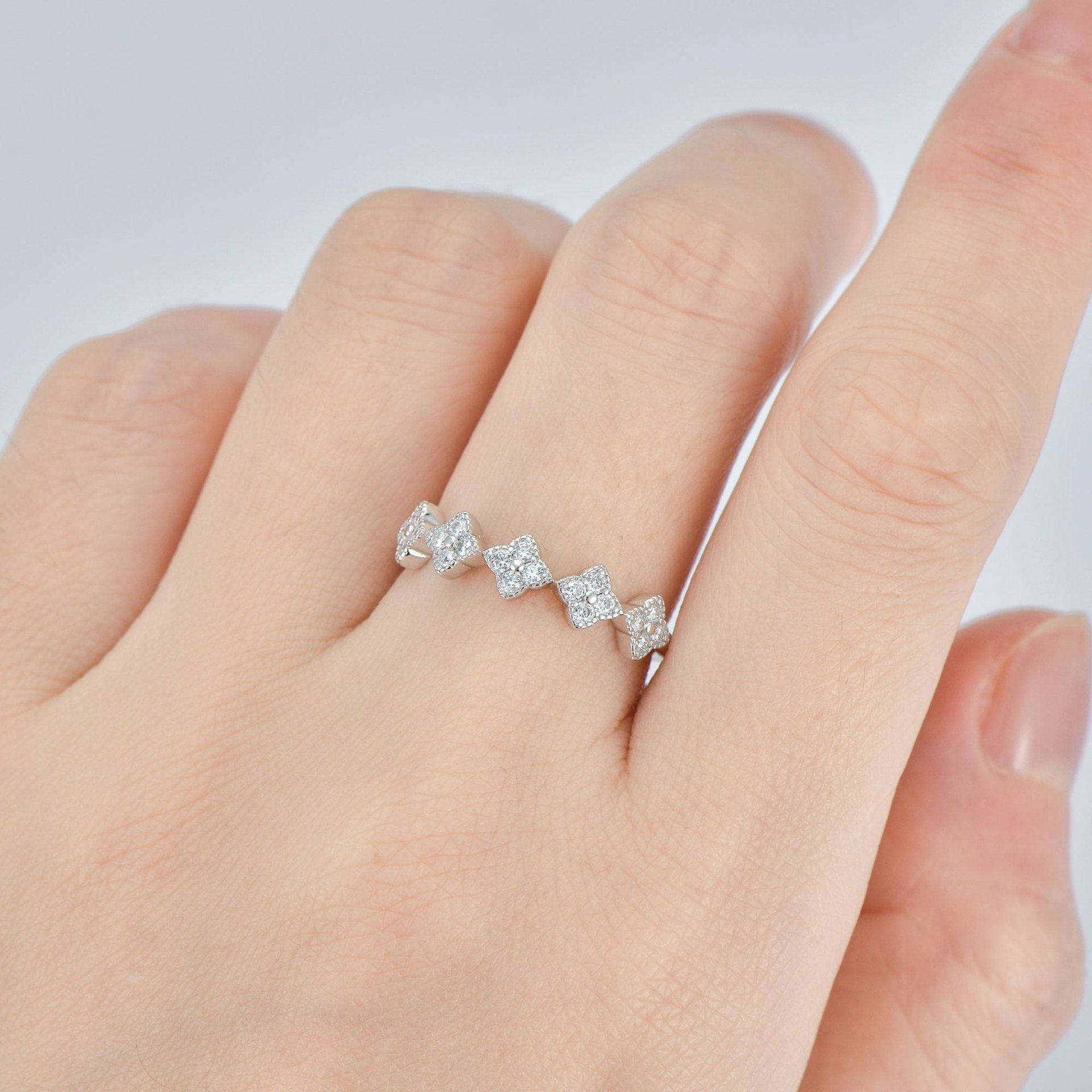 Five Four-Leaf Clover Micro 0.65 Carat Moissanite Diamond Ring set in Platinum Plated 925 Silver